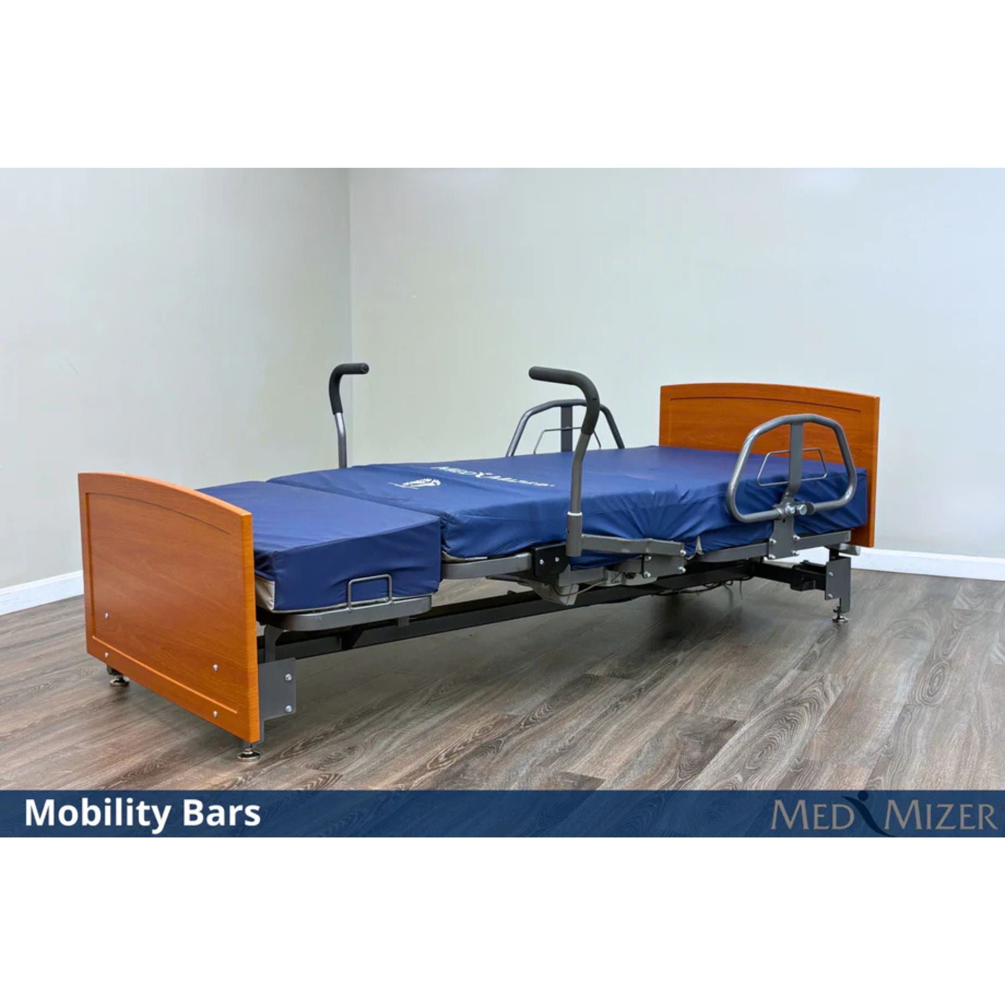 Med-Mizer ActiveCare Fixed bed lying flat with dual padded mobility bar handles mounted at the bed exit side