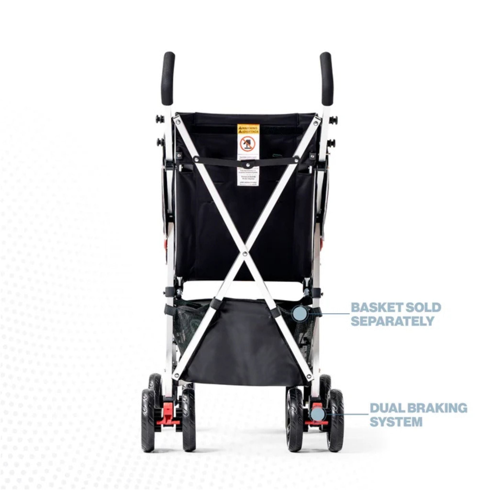 Rear view of a black Coche special needs stroller showing the dual braking system; storage basket sold separately