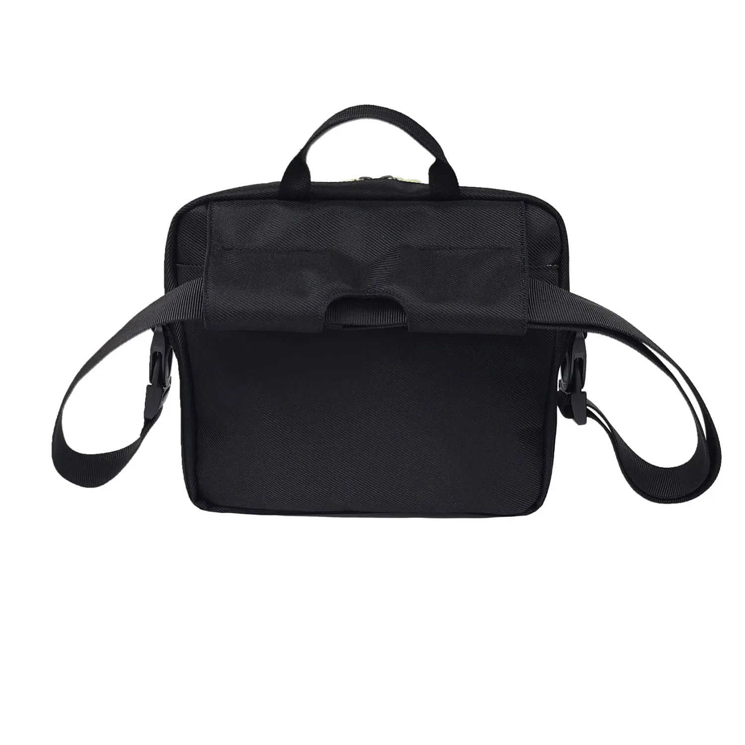 Rear view of FEELDOM MODU-Satchel mounted on wheelchair using secure attachment system for accessible everyday storage in black