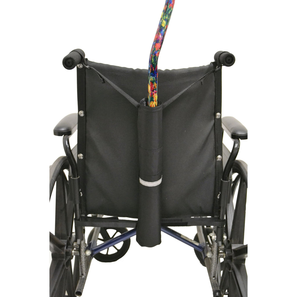 Diestco Cane Holder looped around the push handles of a manual wheelchair, holding an offset cane upright behind the seatback