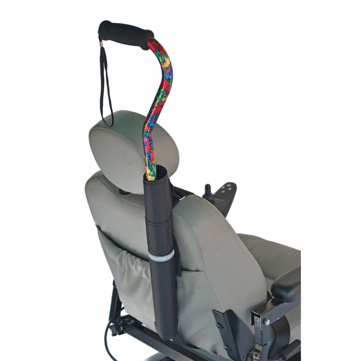 Rear view of the Diestco Cane Holder on a mobility scooter seatback, holding an offset cane upright with reflective strip