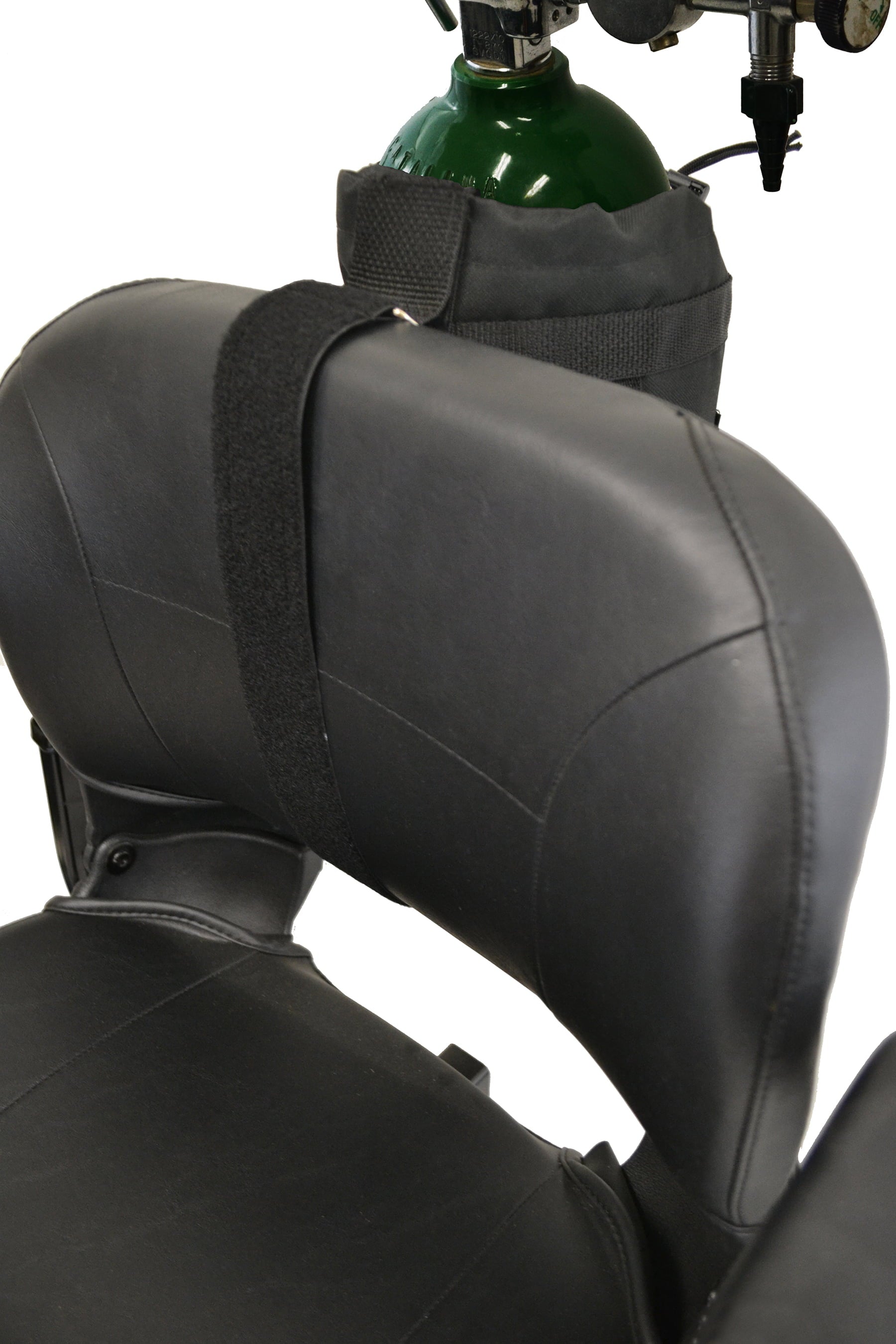 Close-up of the Diestco D tank holder hook-and-loop strap wrapping a scooter seatback with an oxygen cylinder
