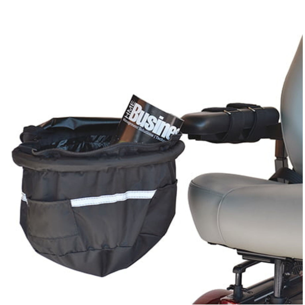 Diestco Front Bag attached to the front of a mobility scooter armrest with quick-release straps, open-top bucket design holding a magazine, with side pocket and reflective strip