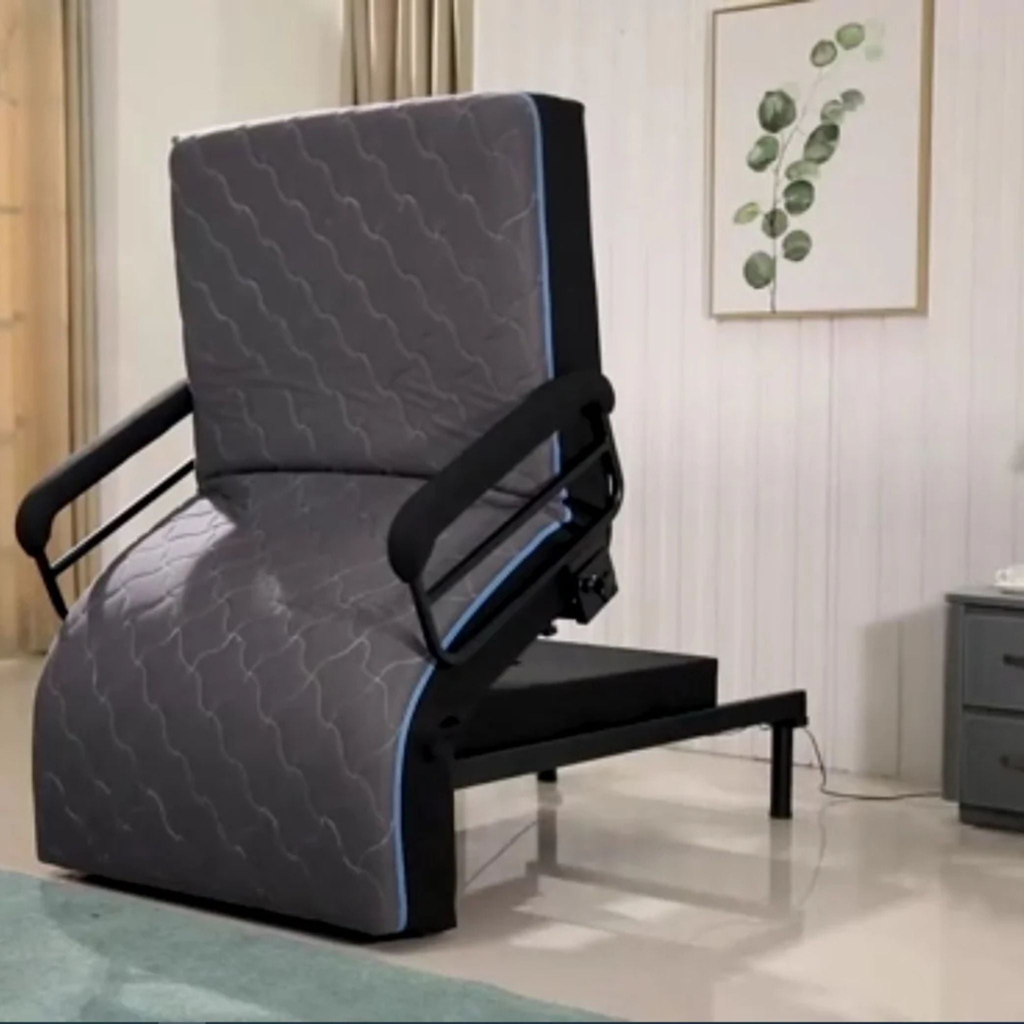 ENVYY Premium Sleep-to-Stand adjustable bed by Platinum Health shown in full upright seated position with padded support rails and ergonomic stand-assist design for safer transfers and independent home mobility.