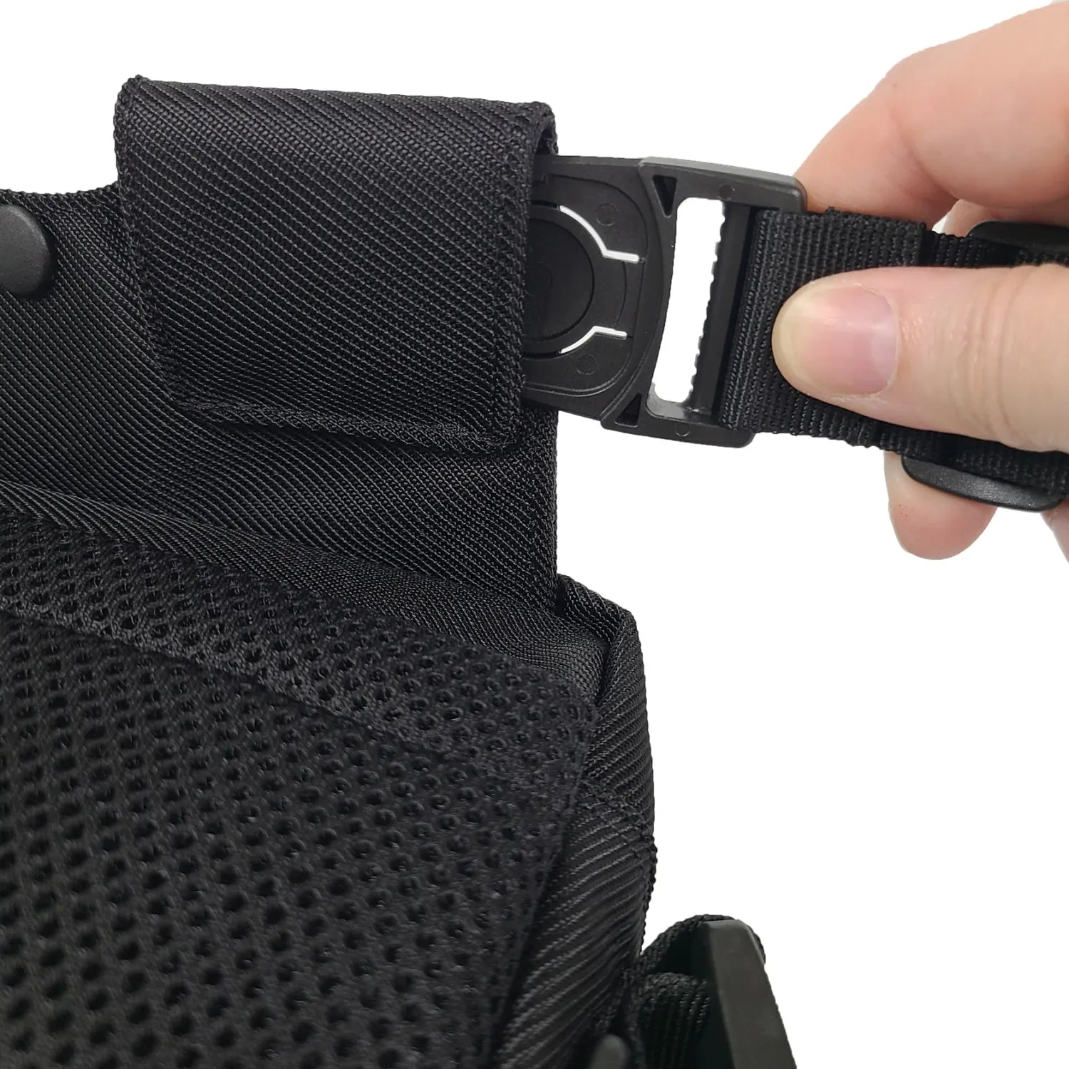 Close-up of FEELDOM MODU-Satchel adaptive wheelchair mounting strap with secure quick-connect attachment hardware
