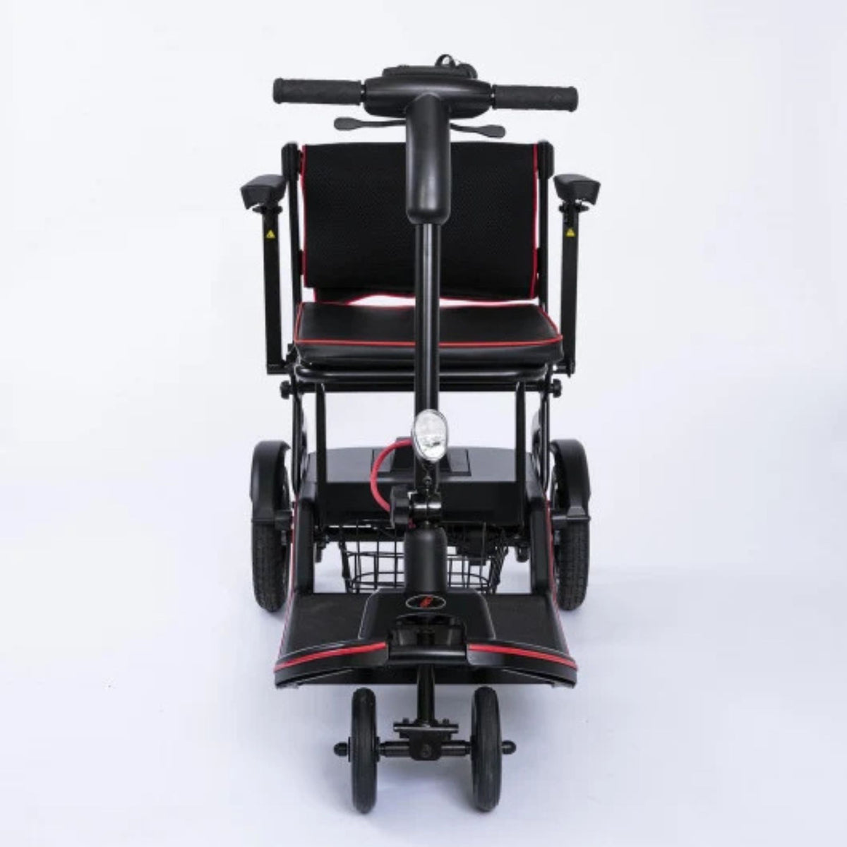 Front view of the Feather Scooter showing the tiller, headlight, front basket, padded seat, and flip-back armrests