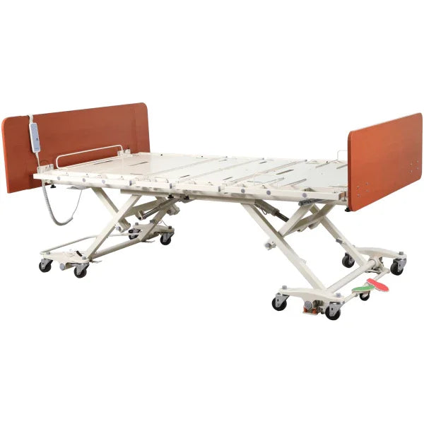 Adjustable electric medical bed with wooden head and footboards on caster wheels