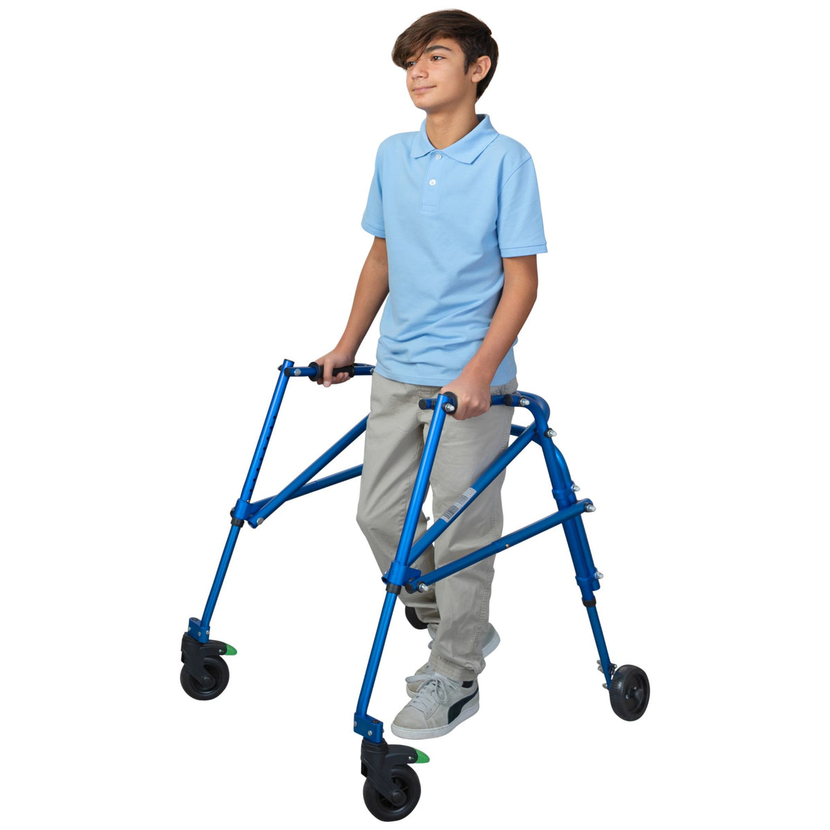 Teen boy walking upright inside a blue Klip posterior walker with height-adjustable handles