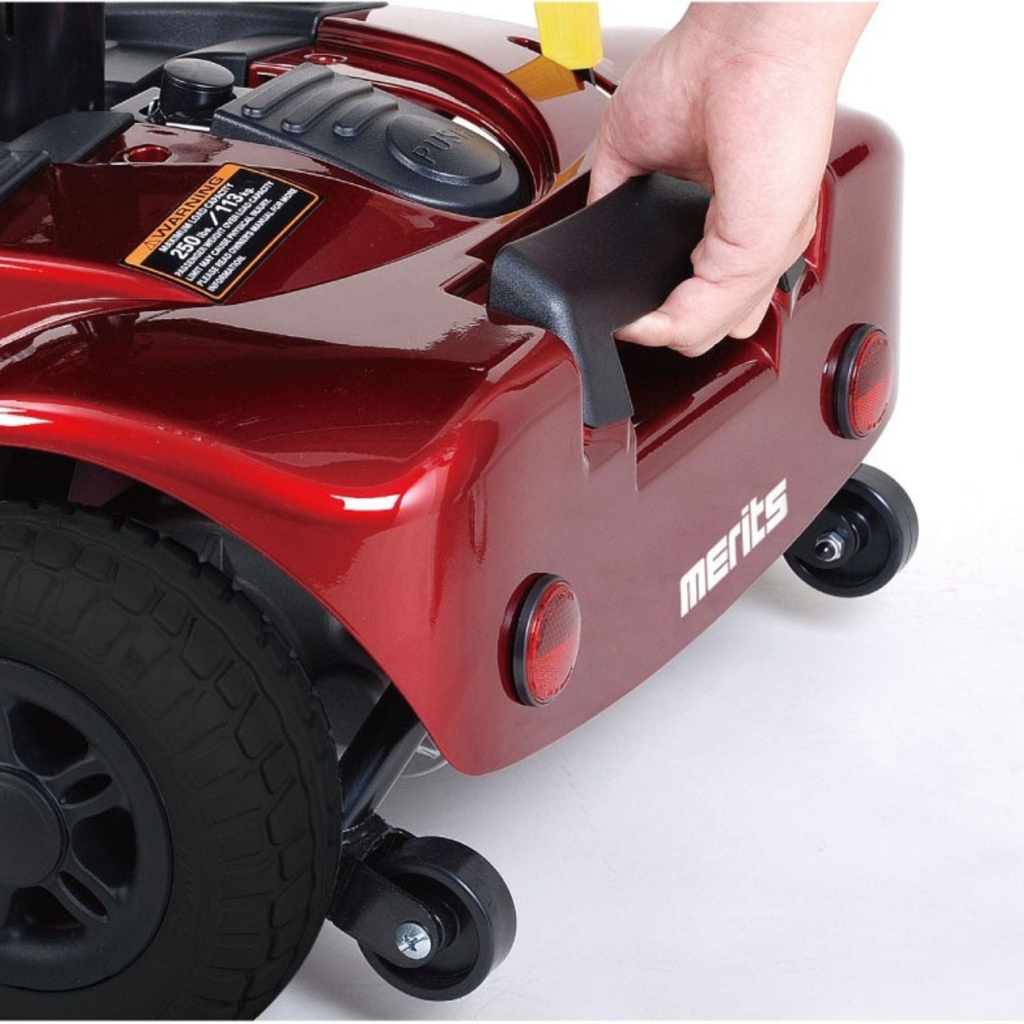 Close-up of the Merits Roadster 3 rear section showing the integrated carry handle for lifting the heaviest transport component.