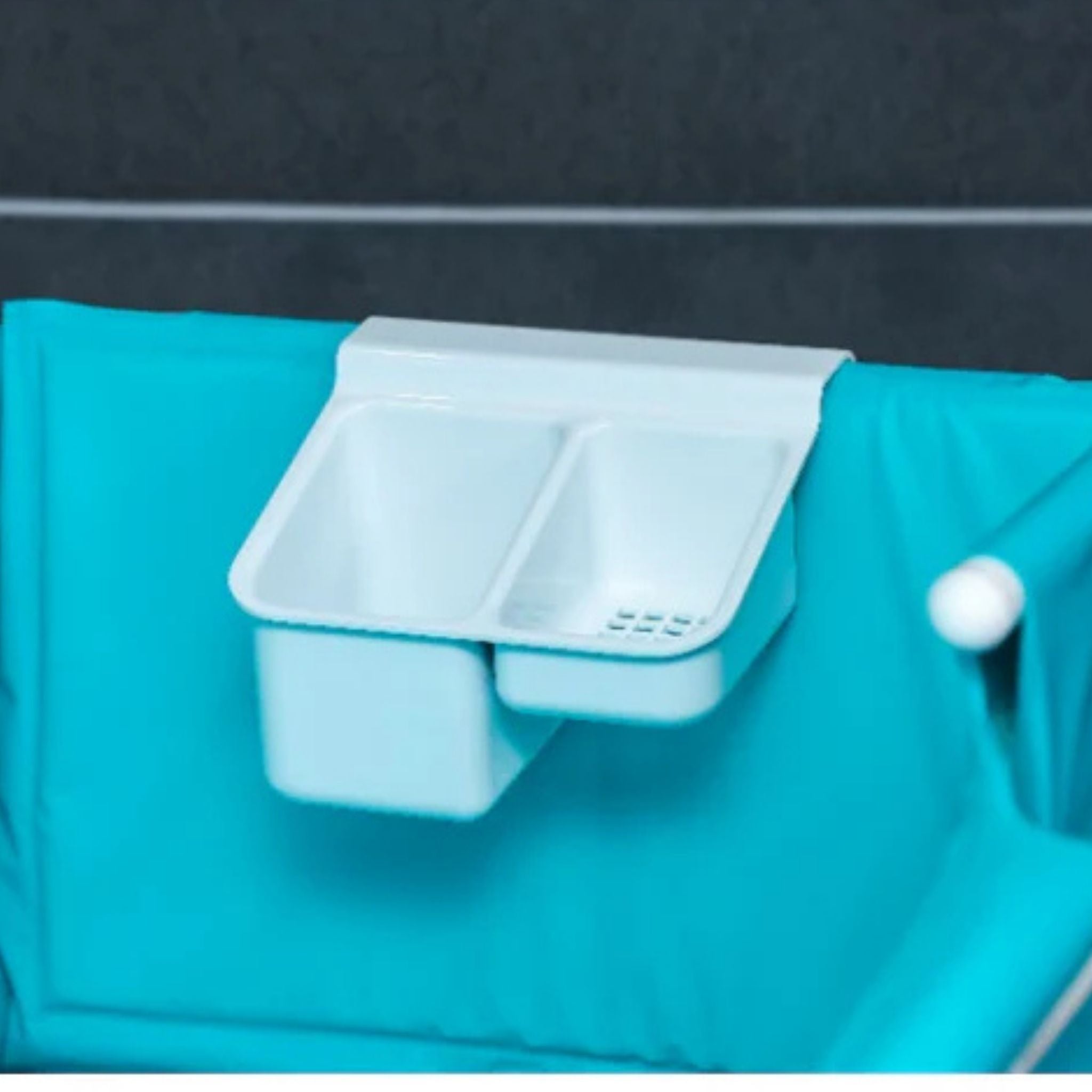 Integrated storage caddy for bathing supplies on Morgan AH Medical bathing trolley