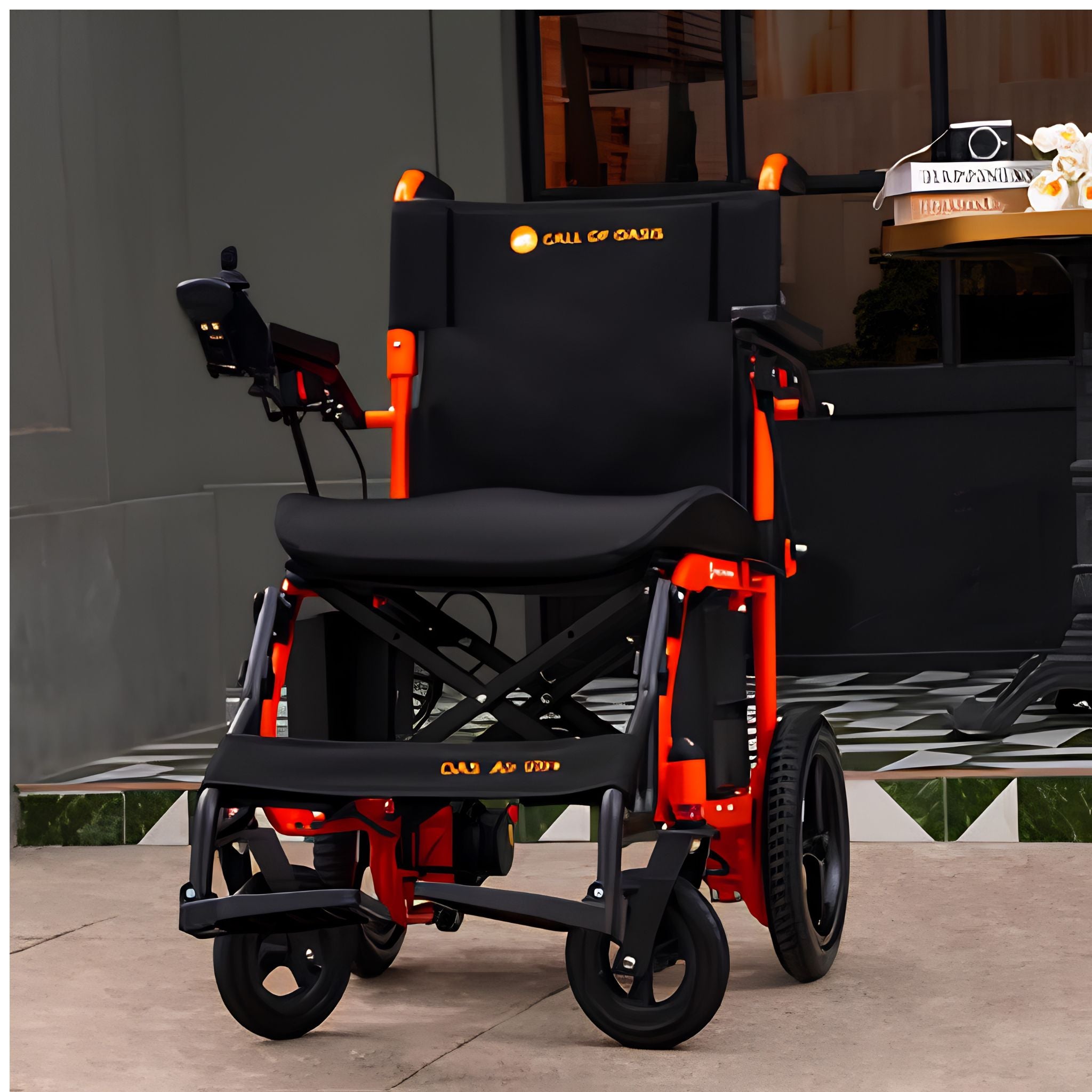 OAS Air Ultra ergonomic cushioned seat and supportive backrest on the orange folding electric wheelchair