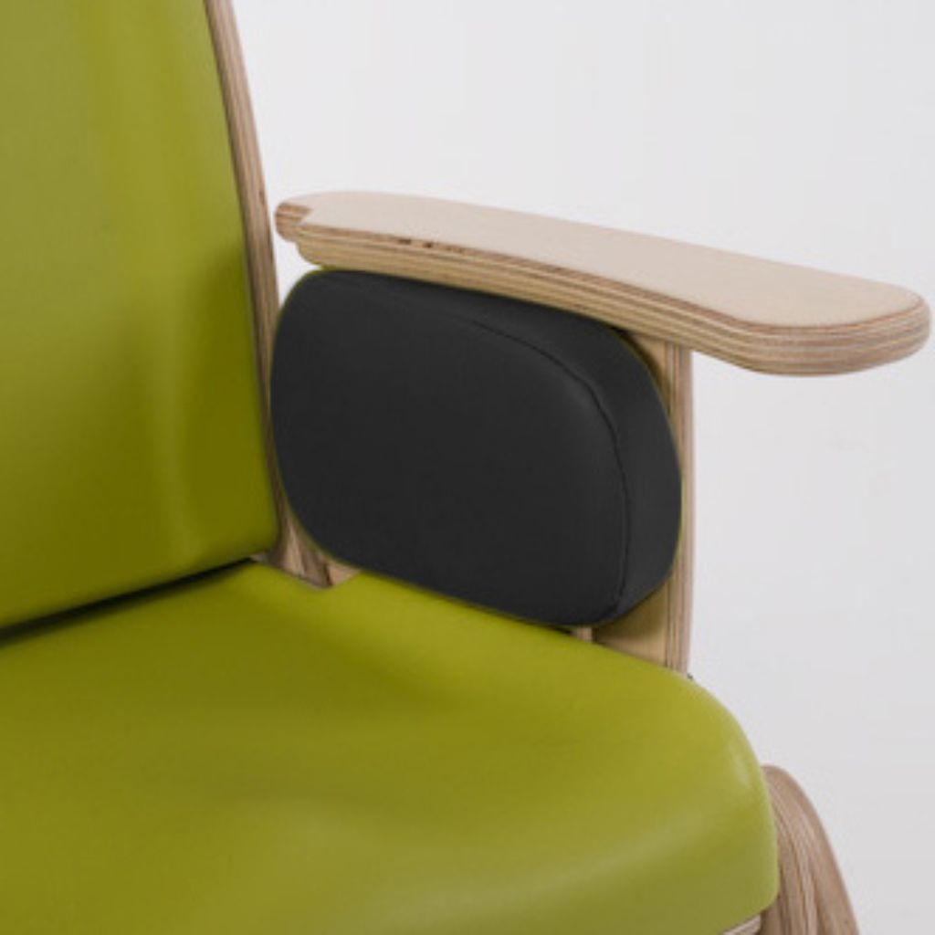 Black side-support cushion fitted to a green Smirthwaite Juni chair to add hip and thigh support.
