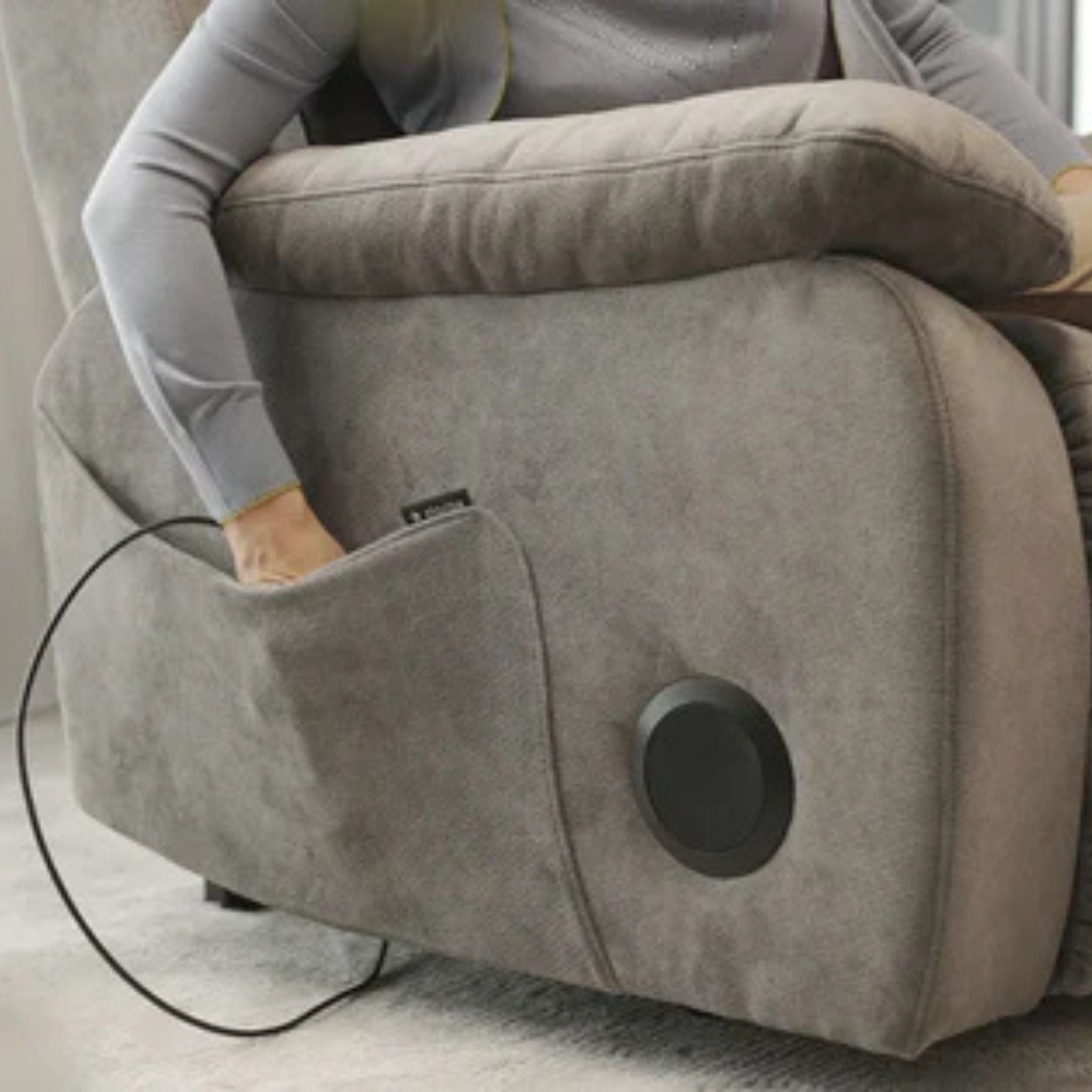 Side storage pocket on Starise power lift recliner for remote controls, accessories, and personal items