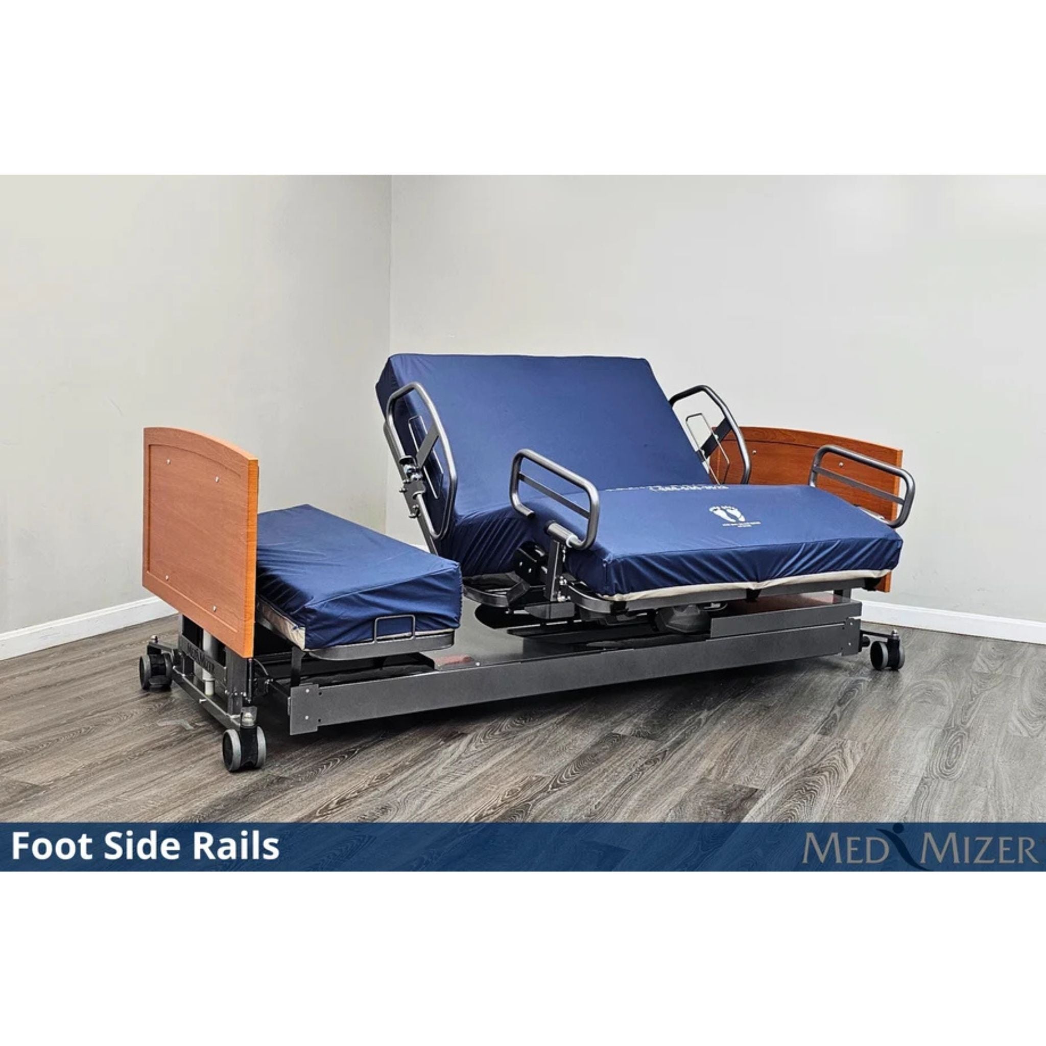 ActiveCare bed reclined with foot side rails and pivoting seat section visible