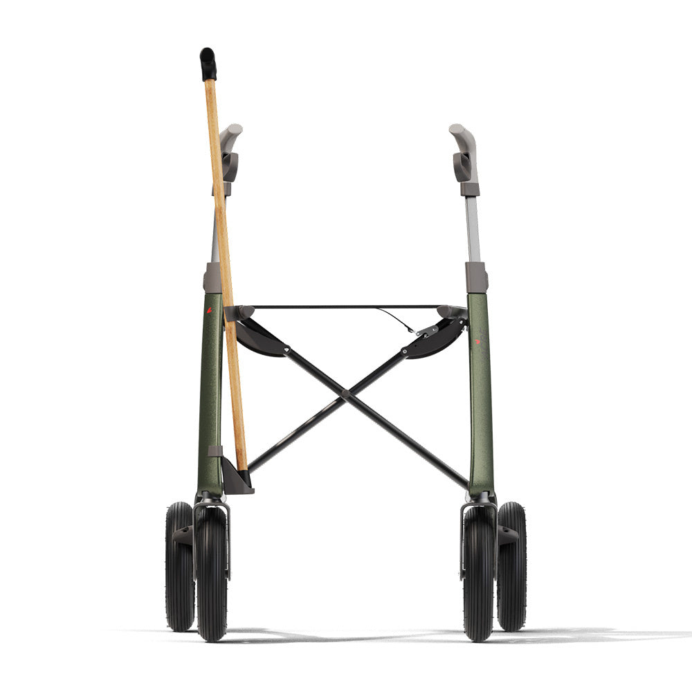 Rear view of the byACRE Carbon Overland rollator with cane securely attached using the cane holder accessory