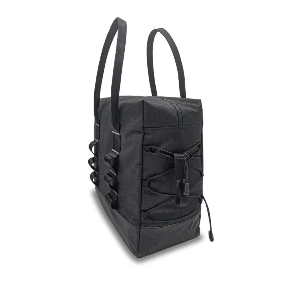 Side view of the charcoal byACRE Daypack rollator bag showing side tie-out loops and a drawcord stash pocket