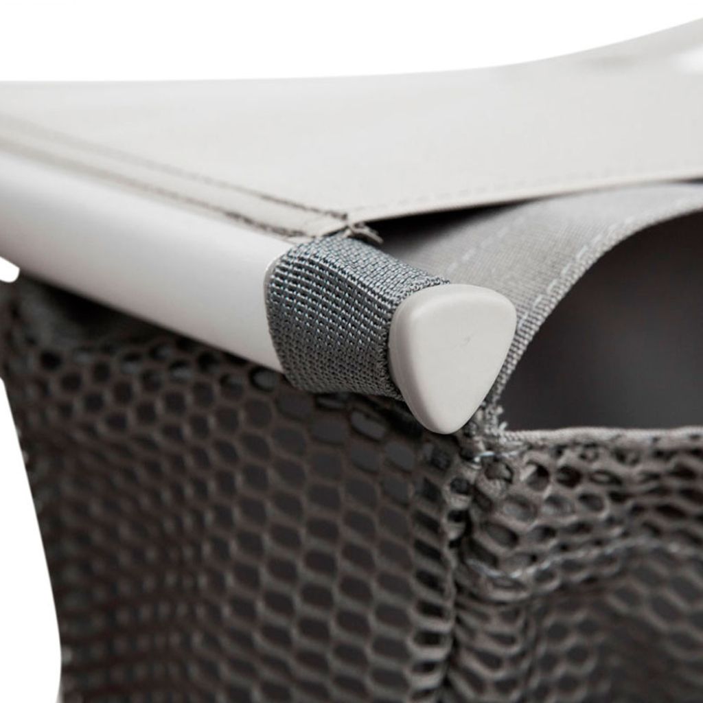 Close-up of the byACRE grocery bag attaching to the rollator frame with a molded strap