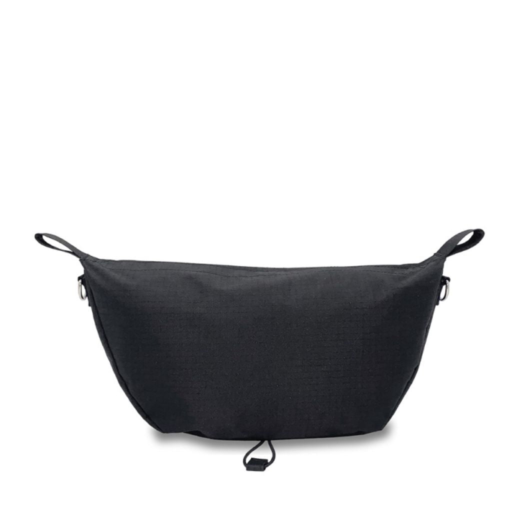 Rear view of the black byACRE Pocket Bag showing side attachment loops and a rear drawcord