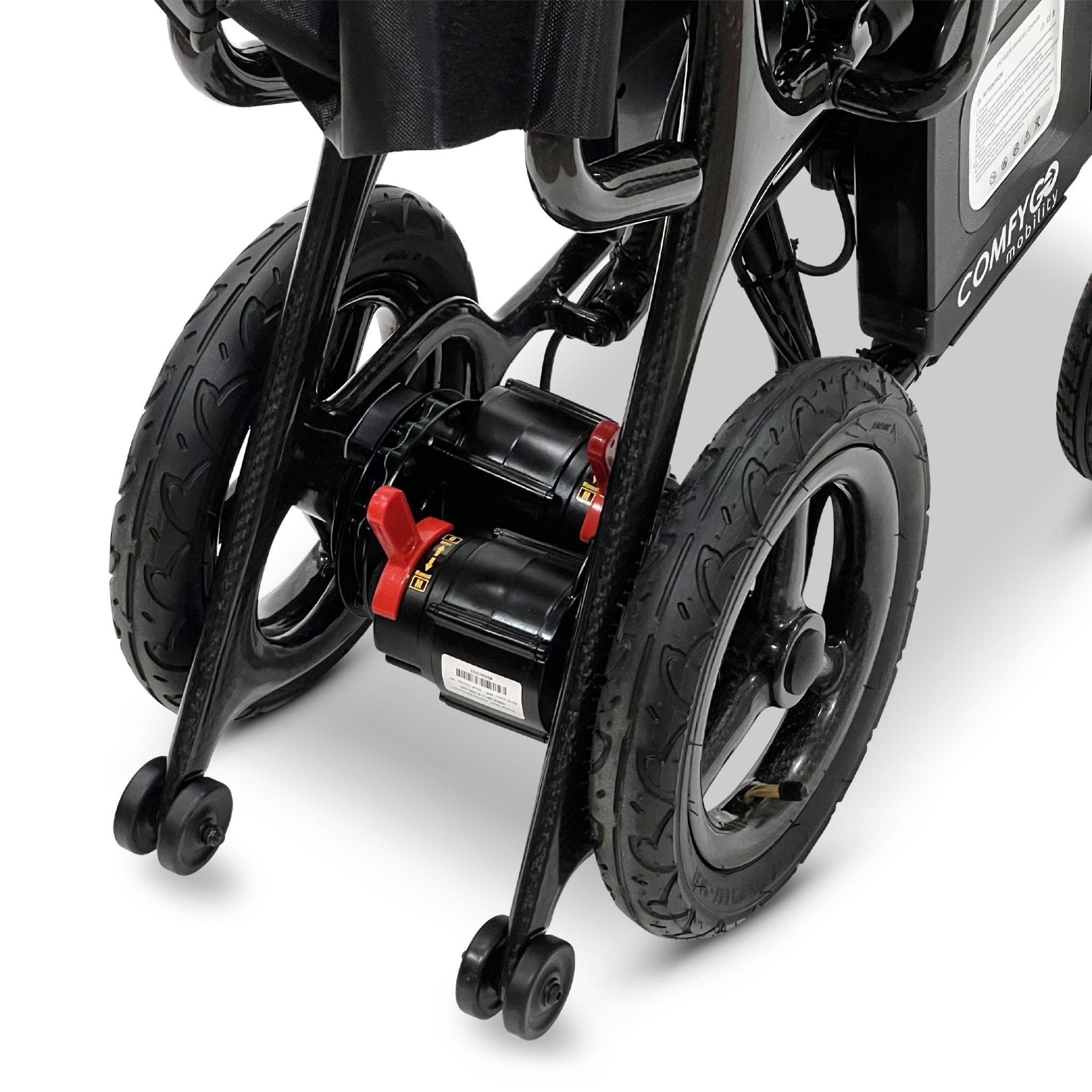 Close-up of the ComfyGO Phoenix Carbon electric wheelchair dual motor drive system with rear wheels, anti-tip wheels, and lightweight carbon fiber folding frame.