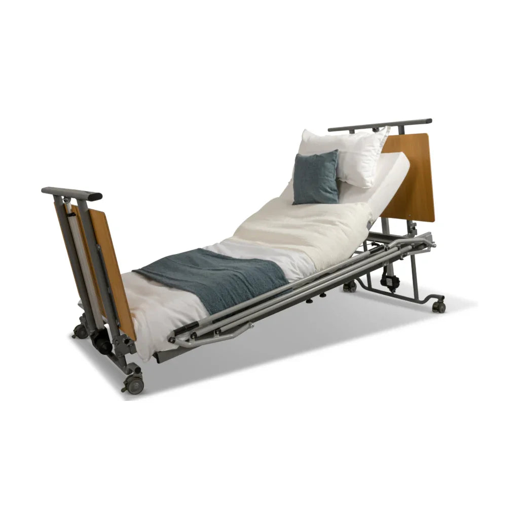 Adjustable low medical bed with wheels and white bedding for mobility support