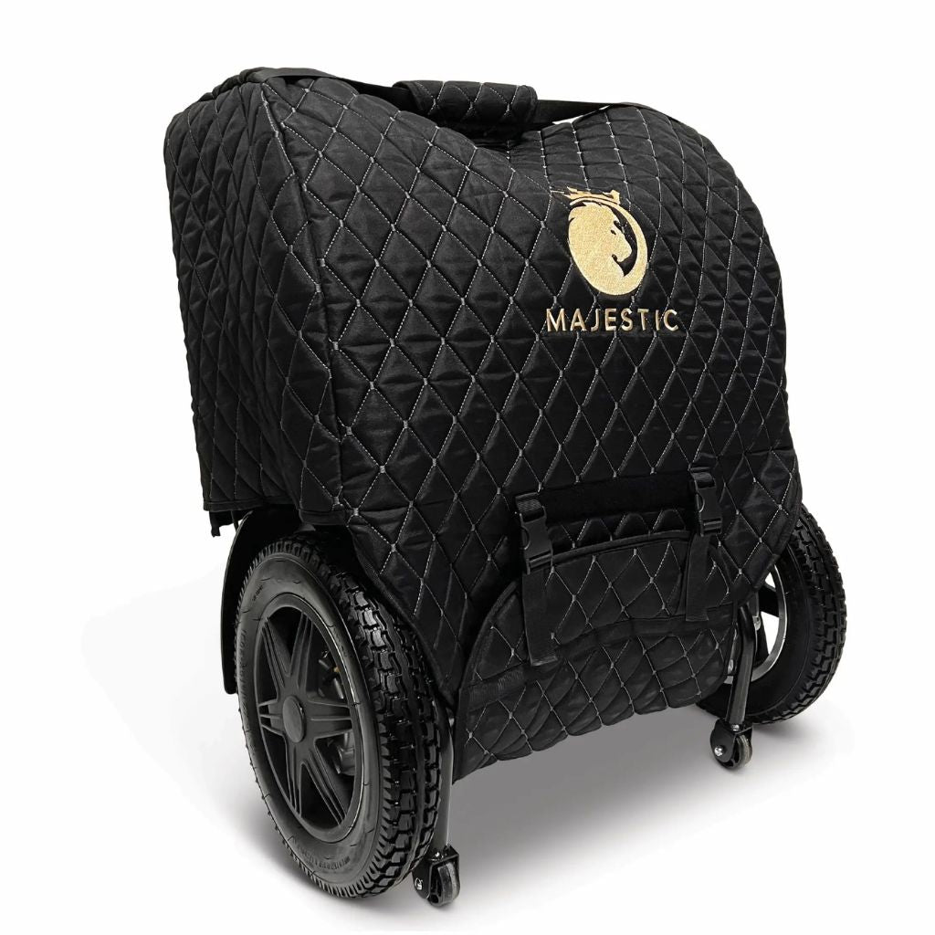 Right angled rear view of the Majestic travel bag on a folded wheelchair, showing the front pocket and buckle straps