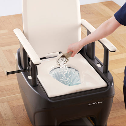 Caregiver scooping solidifying polymer granules into the Wrappon ORB film liner