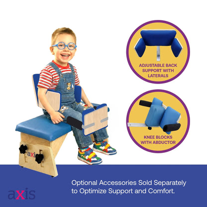 Smiling boy seated on Axis therapy bench with optional adjustable back support with laterals and knee blocks with abductor