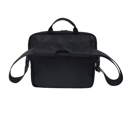 Rear view of FEELDOM MODU-Satchel mounted on wheelchair using secure attachment system for accessible everyday storage in black
