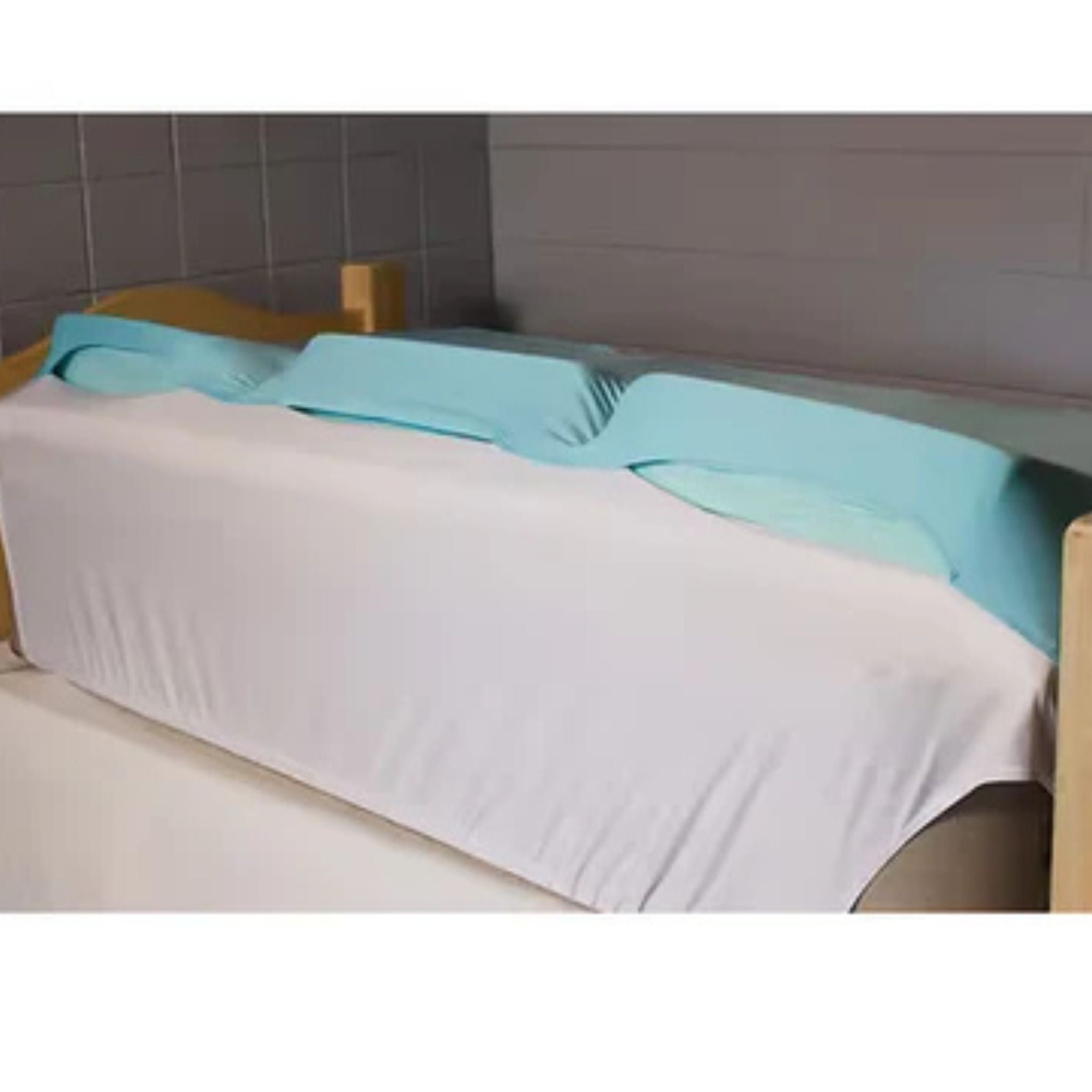 Cloud 9 Care pocket sheet system showing three foam wedges secured in stitched positioning pockets