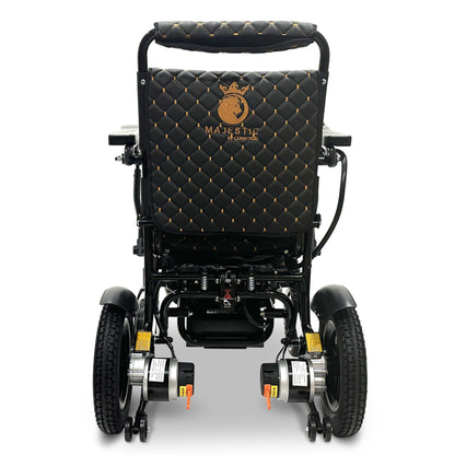 Rear view of the ComfyGO MAJESTIC IQ-8000 electric wheelchair showing dual motors and folding travel-ready frame