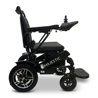 Side profile of the ComfyGO MAJESTIC IQ-8000 folding electric wheelchair showing compact frame and joystick controls