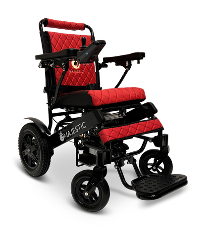 ComfyGO Majestic IQ-9000 folding electric wheelchair in red quilted upholstery with black frame and joystick