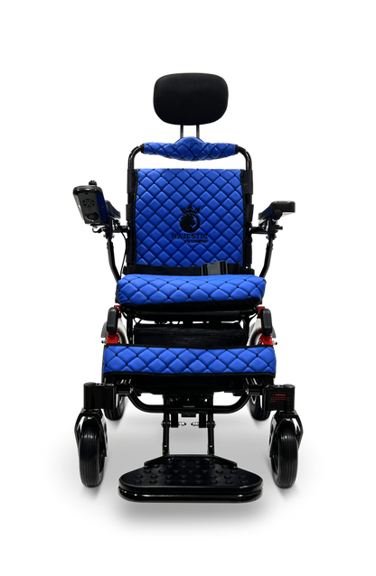 ComfyGO Majestic IQ-9000 electric wheelchair front view in blue quilted upholstery with headrest, joystick, and footplate