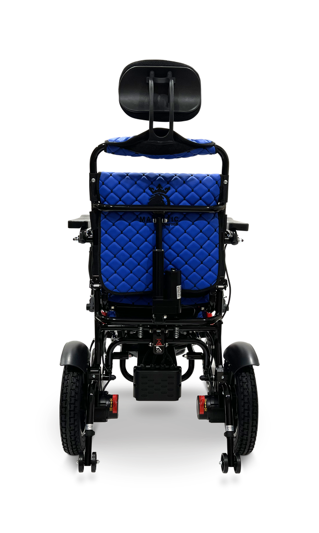 ComfyGO Majestic IQ-9000 electric wheelchair viewed from the back in blue upholstery showing headrest and rear suspension