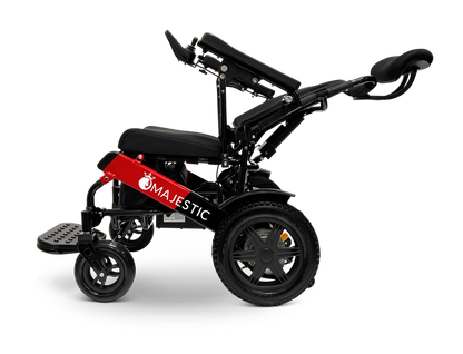 ComfyGO Majestic IQ-9000 electric wheelchair shown from the side with backrest reclined and headrest raised