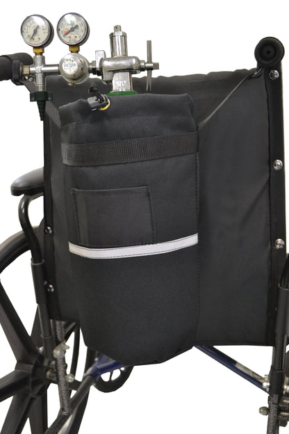 Diestco D tank holder on a wheelchair holding a green oxygen cylinder with regulator, tool pocket, and reflective strip