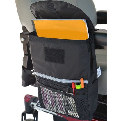Diestco Large Saddle Bag on an armrest holding a binder, with a front mesh pocket, pens, and reflective strip
