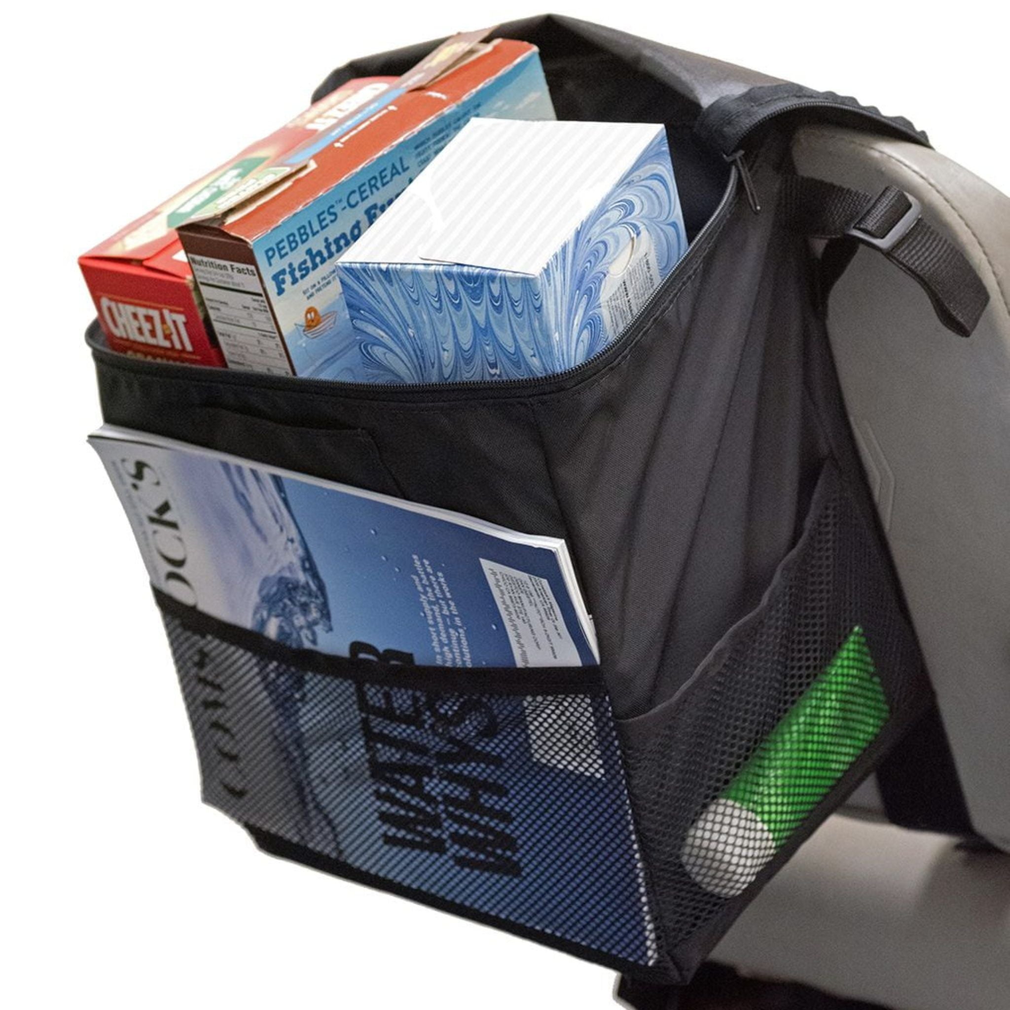 Top view into the open Diestco Mini Monster Bag filled with cereal boxes and a magazine in the front pocket