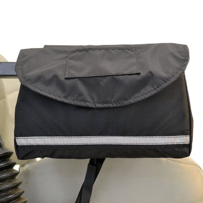 Black Diestco Standard Saddle Bag strapped to a scooter armrest with the flap closed and a reflective strip