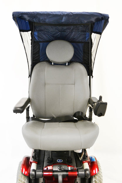 Diestco vented WeatherBreaker canopy in navy blue on a power wheelchair, front view showing the mesh panels