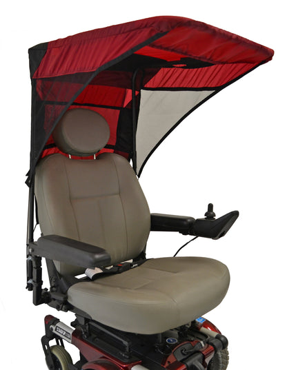 Diestco vented WeatherBreaker canopy in red on a power wheelchair showing the side mesh ventilation window
