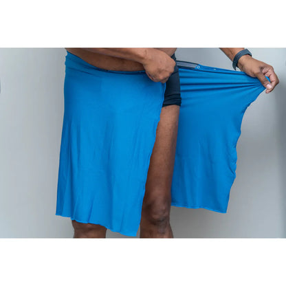 Man demonstrating stretchable quick-drying fabric of Dignity Bath & Spa Wrap