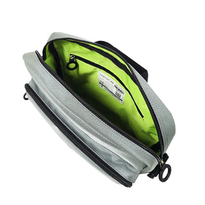 Interior view of FEELDOM MODU-Satchel adaptive bag with high-visibility lining, zipper pocket, and organized storage compartments