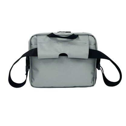 Rear view of silver FEELDOM MODU-Satchel mounted on wheelchair using secure attachment system for accessible everyday storage