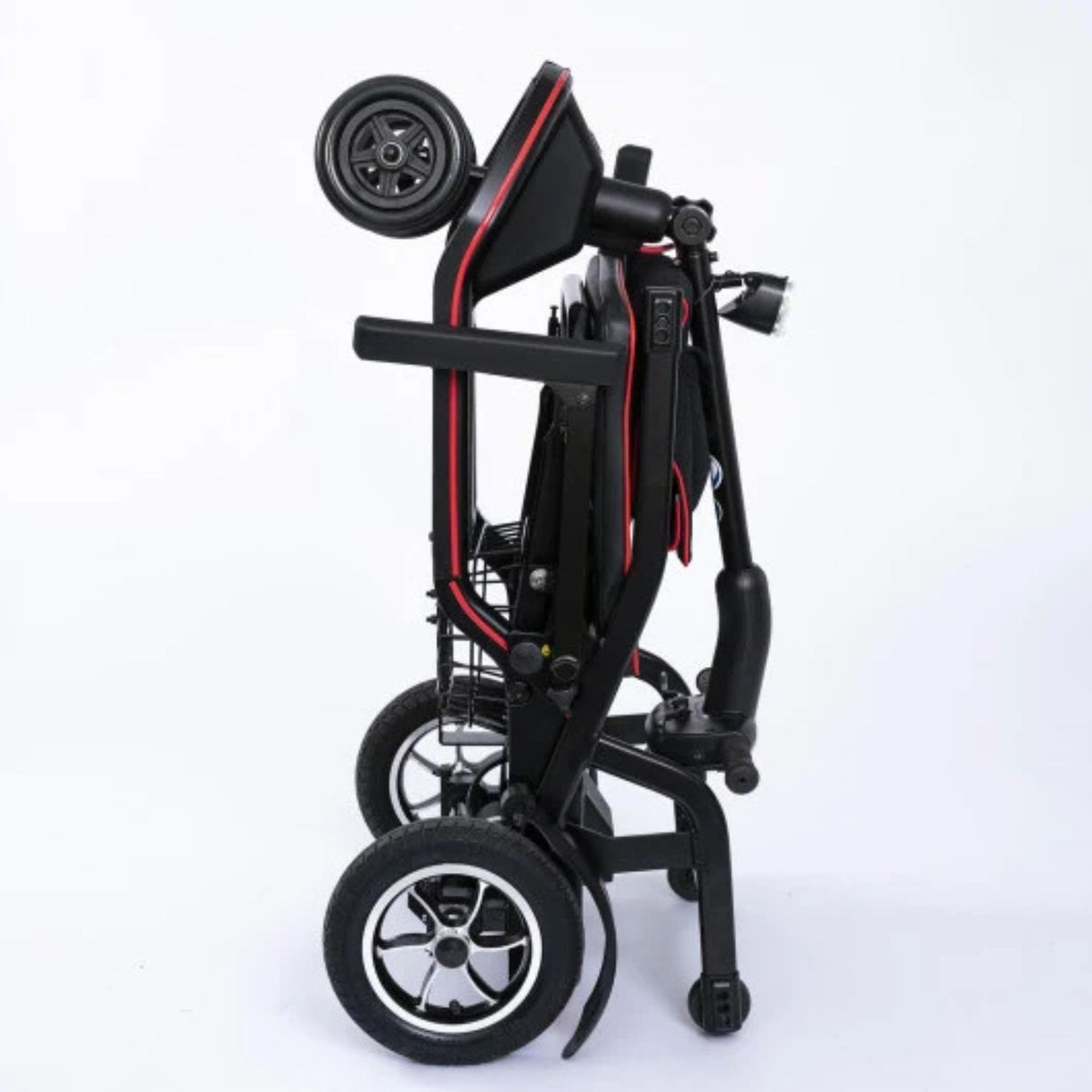 Side view of the Feather Scooter folded upright, showing the compact footprint, front basket, and headlight
