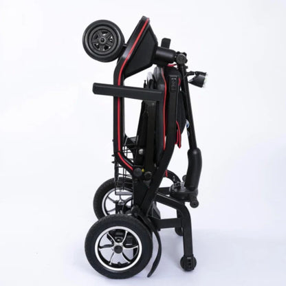 Side view of the Feather Scooter folded upright, showing the compact footprint, front basket, and headlight