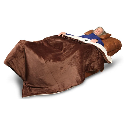 Journey Deluxe Perfect Sleep Chair fully reclined with included blanket for relaxing and resting