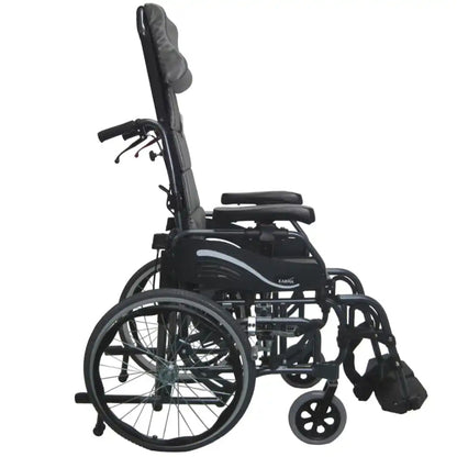 Side profile view of the Karman VIP-515 tilt-in-space manual wheelchair with 20-inch self-propel wheels, ergonomic headrest, adjustable armrests, and elevating leg rests on a white background
