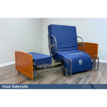 Med-Mizer ActiveCare Fixed bed rotated to seated exit showing foot siderails and blue MedMizer mattress cover