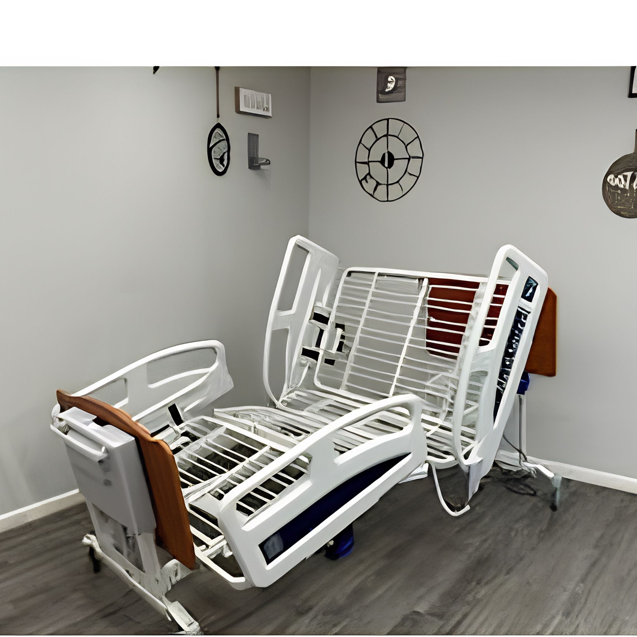 Med-Mizer ComfortWide expandable homecare bed with side rails and wood endboards in a home bedroom